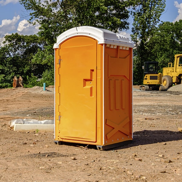 how often are the portable restrooms cleaned and serviced during a rental period in Utting